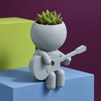 Sage Strummer's Acoustic Set: Guitarist Planter editorial view