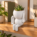 Brickie Moss character planter editorial image