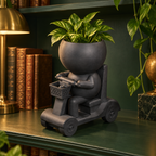 Rollie Rolls in Style | Mobility Scooter Planter editorial view