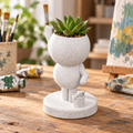Brush Painter Planter in a warm artist studio