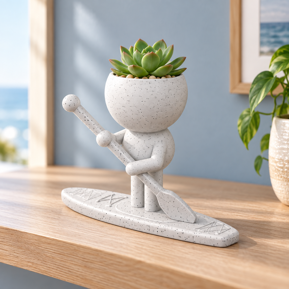 Piper Tidewell's Standing Wave: SUP Paddle Boarder Planter hero lifestyle view