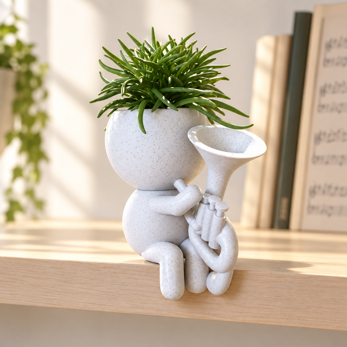 Brass Basil tenor horn planter editorial lifestyle view in Marble White